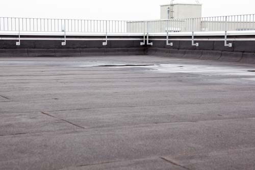 Commercial flat concrete roof.