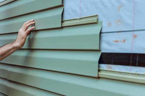 Siding being replaced